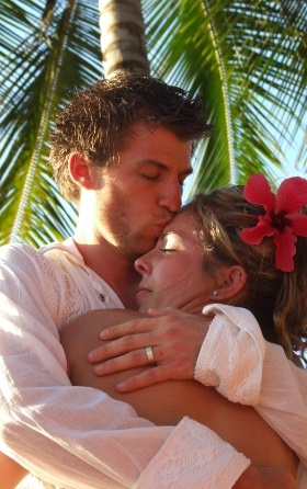 happy newly weds hugging