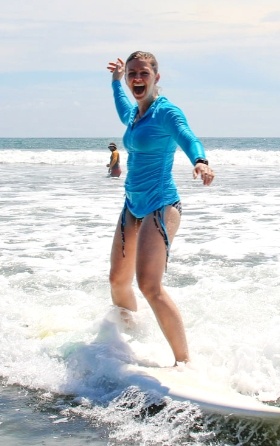 happy girl surfing
