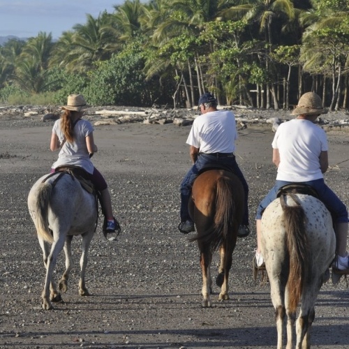 3 people horseback riding in Montezuma Costa Rica