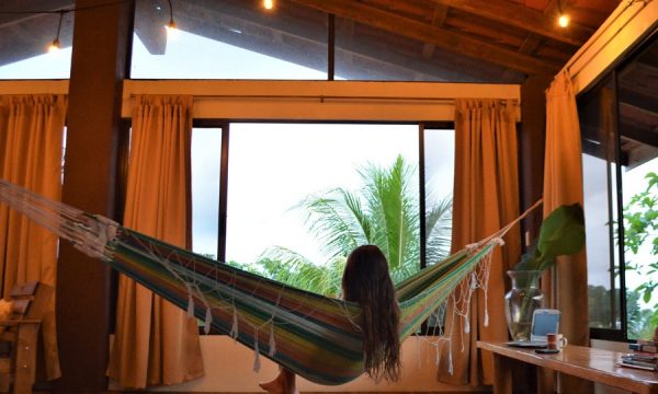 woman relaxing hammock